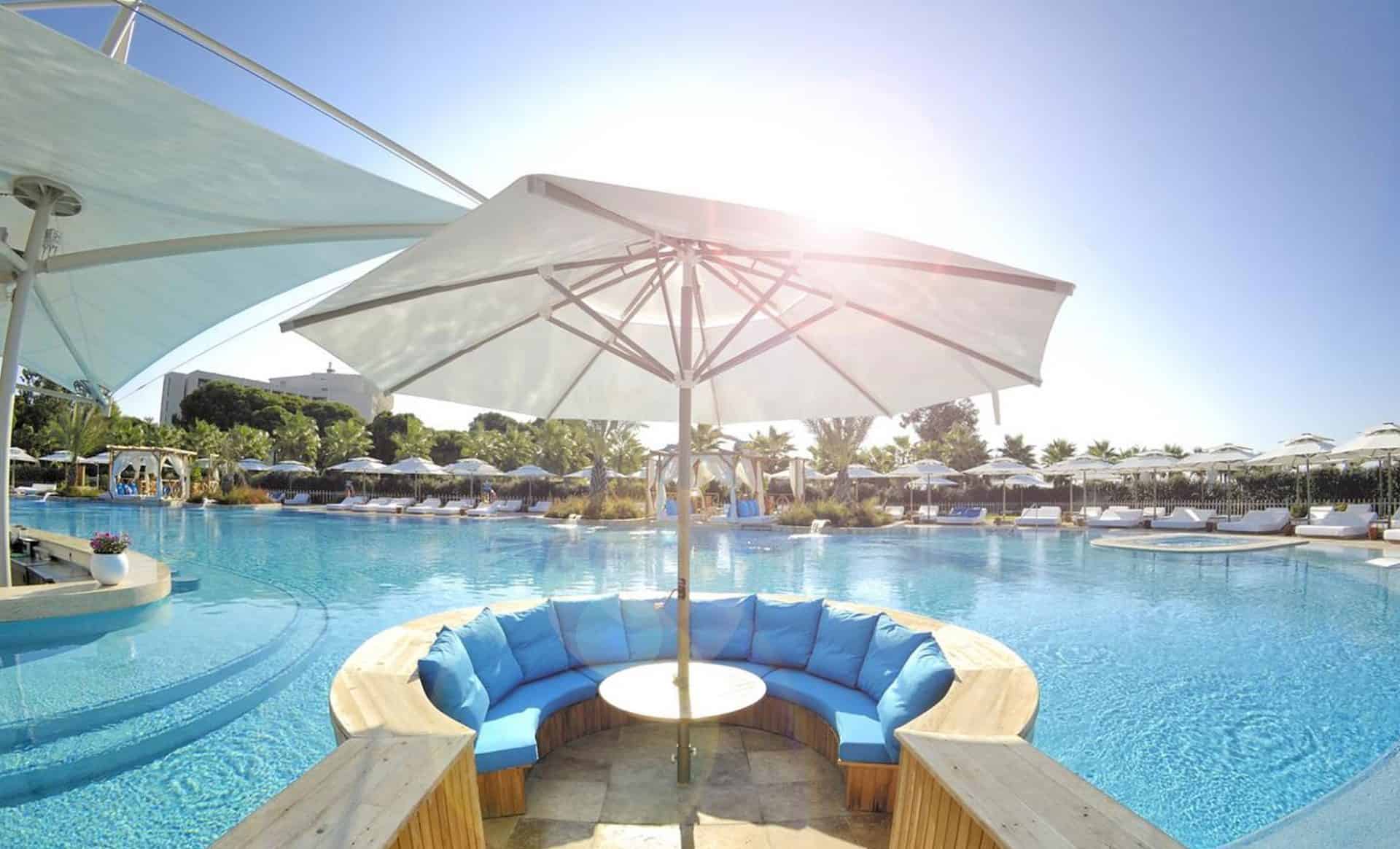 Лимак лара. Regnum carya турция. Отели турции с подогреваемыми бассейнами. Kusadasi golf and spa 5. Adalya elite lara 5* бассейн.